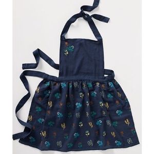 Stacia embroidered indigo apron - Anthropologie
